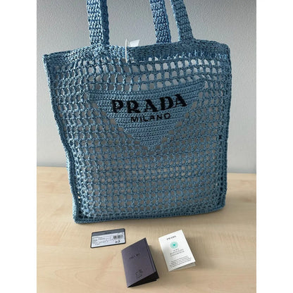 PRADA SHOPPER-TASCHE AUS RAPHIA MIT GEWEBTEM LOGO – BLAU